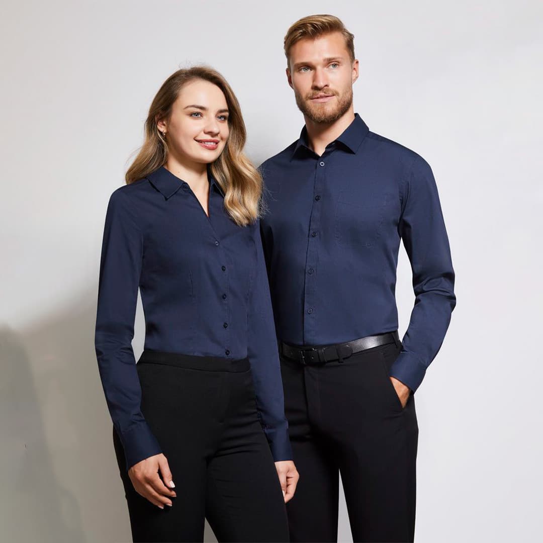 Close-up of a breathable, wrinkle-resistant custom catering dress shirt fabric texture, showing high-quality stitching and smooth surface ideal for hospitality use.