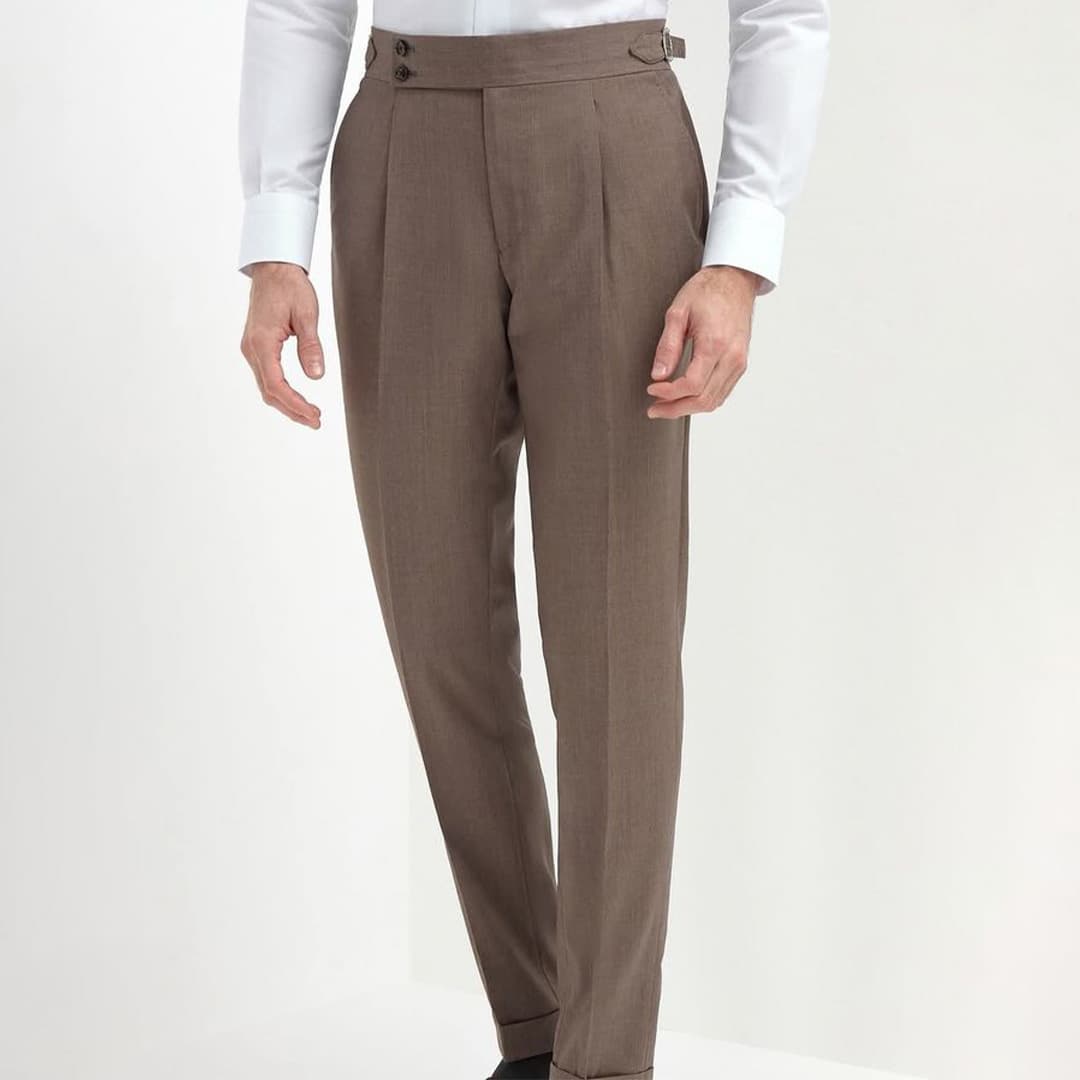 Close-up of high-quality fabric weave highlighting durability and stain resistance on custom waiter pants.